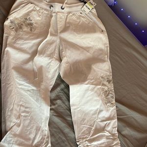White Curvy fit size 4 pants. Has draw strings on the legs .